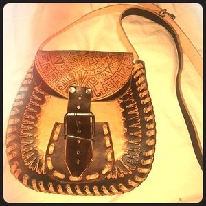 Leather purse, hand tooled details